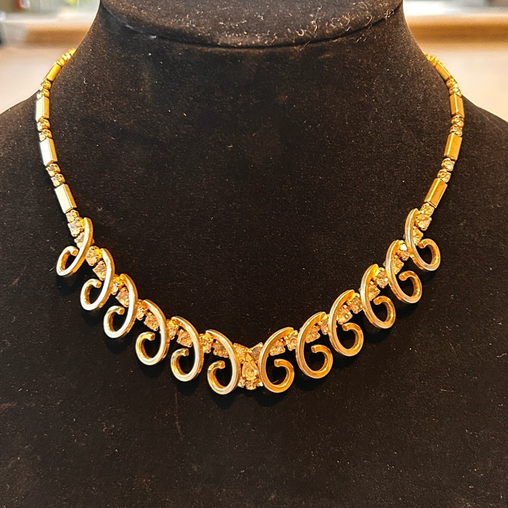 Sarah Coventry Celestial Fire Necklace, gold intricate design with crystals.​